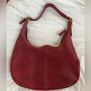 Vintage coach purse, circa 1990. She’s a beauty. In perfect condition.